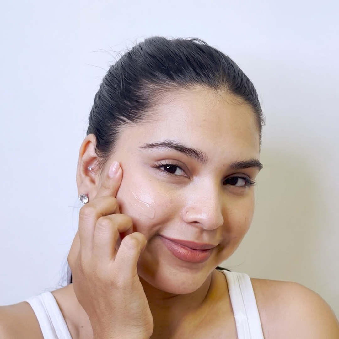 Girl Applying Moisturiser on Face