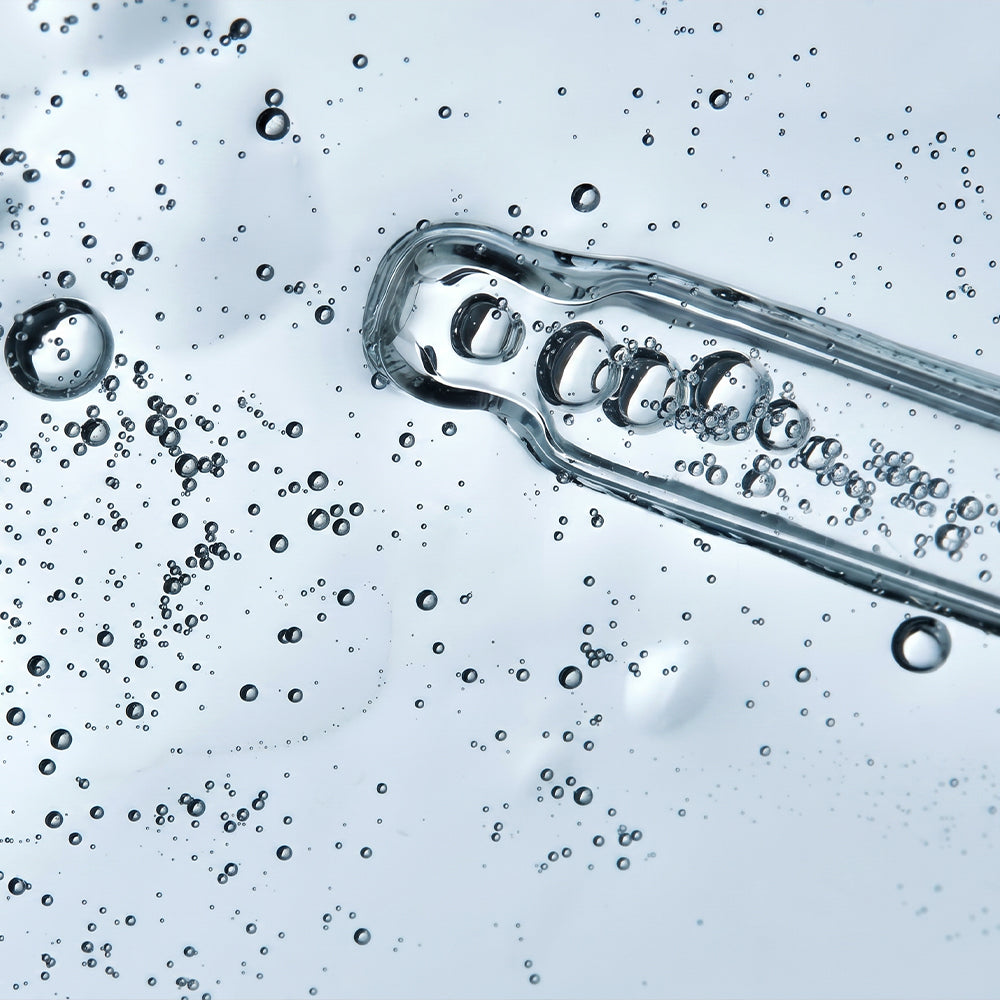 The texture of hyaluronic acid serum with lots of bubbles